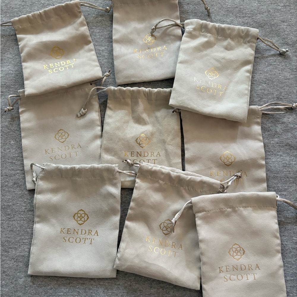 9 Kendra Scott Cream Jewelry Pouches with Gold Logo